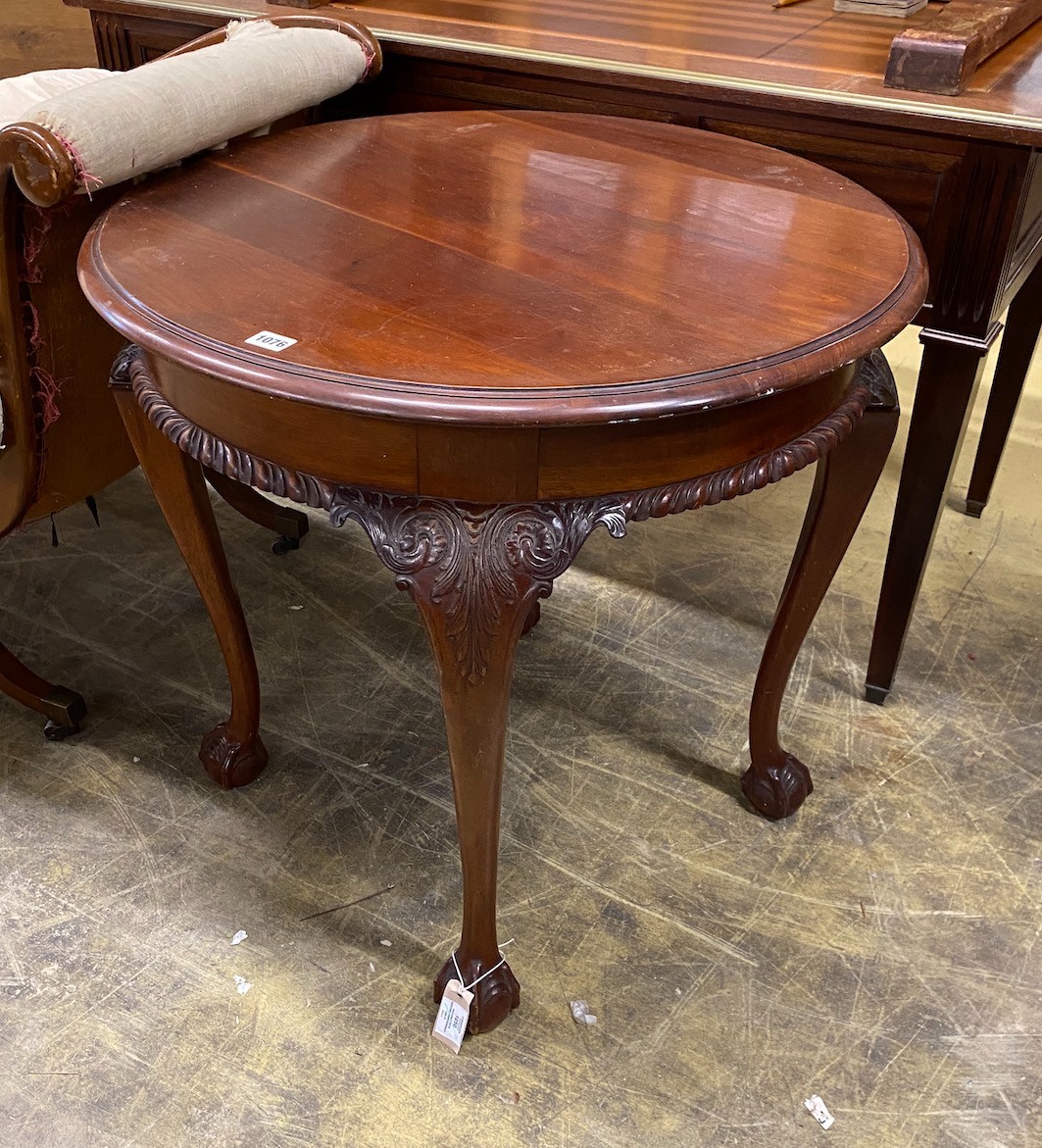 An early 20th century Chippendale revival circular mahogany centre table, diameter 73cm, height 70cm